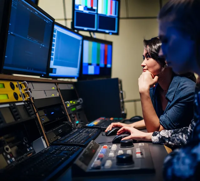 Woman editing at TV studio