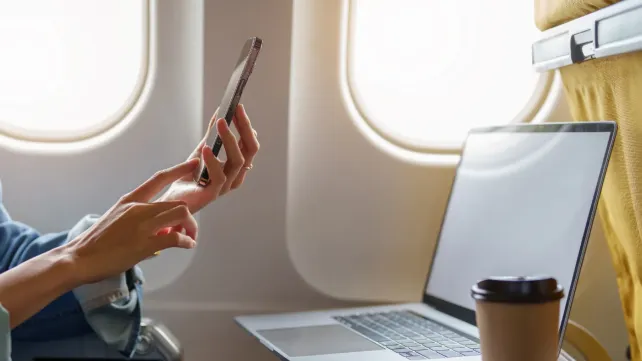 IMAGE_Press_woman-sitting-at-window-seat_GettyImages-1408199030_080425.webp