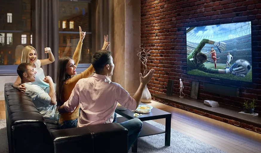 People watching UHD Big Flat TV
