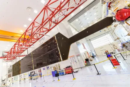 EUTELSAT KONNECT VHTS satellite solar panel fully deployed in a test conducted in a cleanroom facility at Thales Alenia Space in Cannes