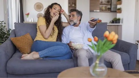 IMAGE_Press_Father-and-daughter-watching-TV_GettyImages-2222528879_121225.webp