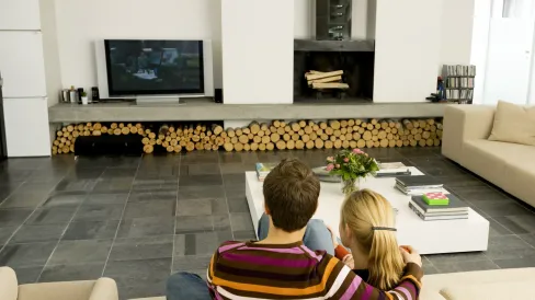 IMAGE_Press_Young-couple-sitting-on-a-couch_GettyImages-82115535_010725.webp