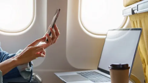 IMAGE_Press_woman-sitting-at-window-seat_GettyImages-1408199030_080425.webp