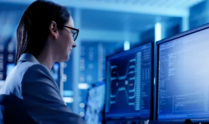 Close-up Shot of Female IT Engineer Working in Monitoring Room
